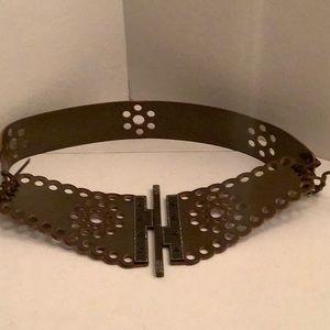 Valentino Wide Cut out Belt with jeweled hidden buckle.